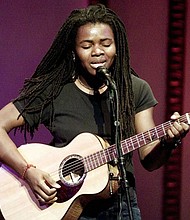 Tracy Chapman performing in New York in 2001. Chapman continues to make history with her 1988 hit “Fast Car” after winning song of the year at Wednesday’s Country Music Awards.
Mandatory Credit:	Brad Rickerby/Reuters