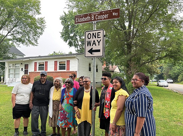 Jane Cooper Johnson, fourth from right, is surrounded by family members last June when an honorary street sign was erected in Richmond’s Westwood community to honor her mother, Bettie Elizabeth Boyers Cooper.