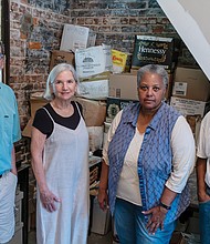 From left, James ‘Jim’ Vigeant, Sasha Finch, Janis Allen and Theodore Holmes stand in the Jackson Ward home in which Roland J. “Duke” Ealey’s legal documents were discovered.