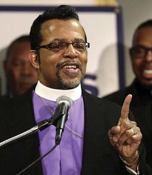 Bishop Carlton Pearson speaks at a news conference accompanied by other clergy members, April 4, 2013, in Chicago. Once one of the best known preachers in the nation, Bishop Pearson underwent a cataclysmic theological shift that altered the course of his life.