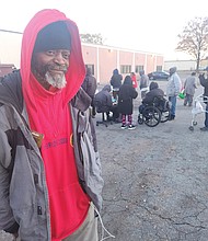 Bobby Moore, 57, is among those waiting for the Salvation Army shelter to open. The shelter operates from 5 p.m. to 8 a.m. seven days a week, providing meals. The shelter’s capacity is 110 men and 40 women.