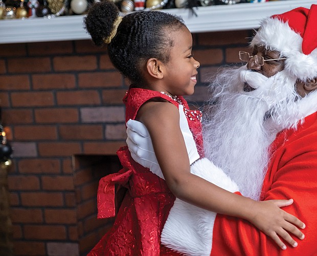 All smiles-Kinsley Hurte, 5, is excited to meet Soul Santa and give him her holiday wish list at the Black History Museum & Cultural Center of Virginia on Dec. 2.
Sandra Sellars/Richmond Free Press