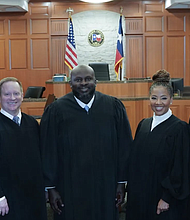 Harris County Judge Jermaine Thomas (center) with other judges