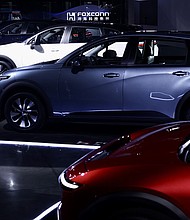 Various EV models during Hon Hai Technology Day (HHTD23) in Taipei, Taiwan, on October 1. Foxconn showcased their EV line up, including their new Model N cargo van, and signaled mass production plans for Model B, a 'sporty and intelligent crossover.'
Mandatory Credit:	Ritchie B Tongo/EPA-EFE/Shutterstock