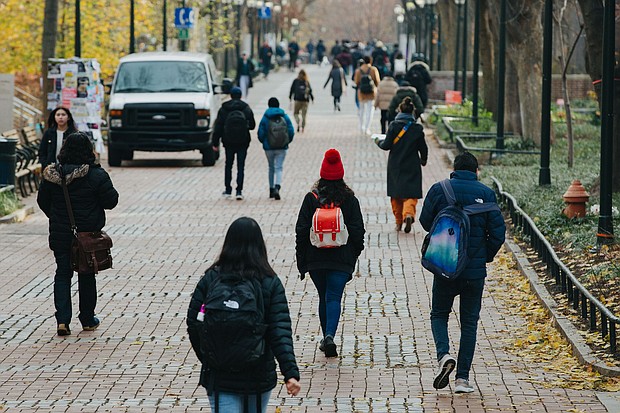 Students on the University of Pennsylvania campus in Philadelphia on December 8.
Mandatory Credit:	Michelle Gustafson/Bloomberg/Getty Images