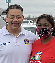 Chief Sam Pena and volunteer