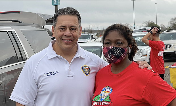 Chief Sam Pena and volunteer