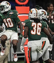 Florida A&M’s Jah’Marae Sheread celebrates after his touchdown catch in the Rattlers 30-26 win Saturday over Howard University in the Celebration Bowl.