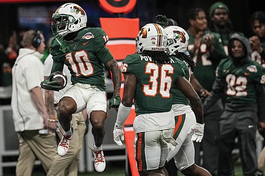 Florida A&M’s Jah’Marae Sheread celebrates after his touchdown catch in the Rattlers 30-26 win Saturday over Howard University in the Celebration Bowl.