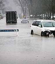 Cars are submerged in flood water in Elmsford, New York, after a powerful storm on Monday.
Mandatory Credit:	Kena Betancur/Getty Images