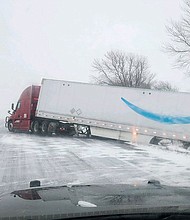 The storm created dangerous conditions on Interstate 80 in Nebraska on Monday. This truck went off the highway between Grand Island and Lincoln, police said.
Mandatory Credit:	Nebraska State Patrol