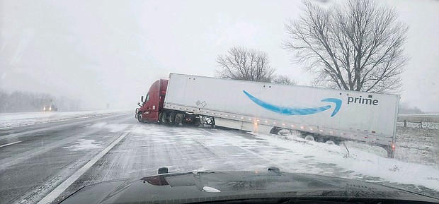 The storm created dangerous conditions on Interstate 80 in Nebraska on Monday. This truck went off the highway between Grand Island and Lincoln, police said.
Mandatory Credit:	Nebraska State Patrol