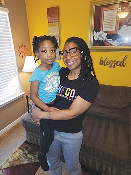 “I have been prevented from being in my children’s lives,” said Tina D. Woodson of Hanover County. Ms. Woodson holds her youngest child, whom the Hanover County Juvenile and Domestic Relations Court allowed to remain with her, but not her other three children. “It’s unbelievable.”