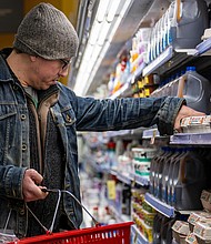 A customer shops for eggs at a H-E-B grocery store on February 08, in Austin, Texas. Egg prices spiked after a deadly avian flu affected supply.
Mandatory Credit:	Brandon Bell/Getty Images