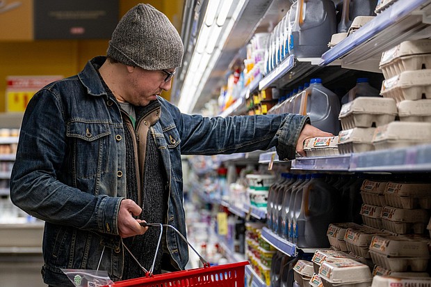 A customer shops for eggs at a H-E-B grocery store on February 08, in Austin, Texas. Egg prices spiked after a deadly avian flu affected supply.
Mandatory Credit:	Brandon Bell/Getty Images
