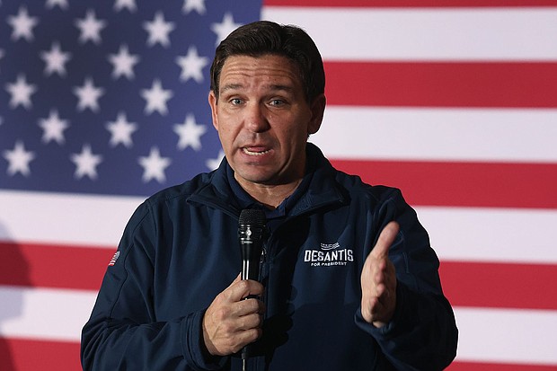 Florida Gov. Ron DeSantis speaks to guests during a campaign rally on December 2, in Newton, Iowa.
Mandatory Credit:	Scott Olson/Getty Images