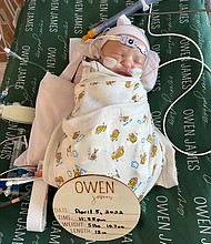 Owen Monroe was 18 days old when he made history.
Mandatory Credit:	Nick and Tayler Monroe
