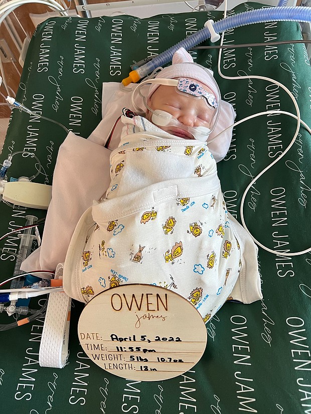 Owen Monroe was 18 days old when he made history.
Mandatory Credit:	Nick and Tayler Monroe