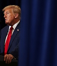 Former President Donald Trump attends a campaign event in Waterloo, Iowa, on December 19, 2023.
Mandatory Credit:	Scott Morgan/Reuters