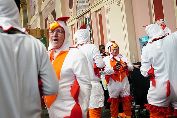 Fancy dress is the name of the game for those attending Alexandra Palace for the darts.
Mandatory Credit:	Zac Goodwin/PA Images/Getty Images