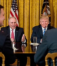 In this 2017 photo, President Donald Trump listens as Rep. Steve Scalise speaks in the East Room of the White House in Washington, DC.
Mandatory Credit:	Andrew Harnik/AP/File