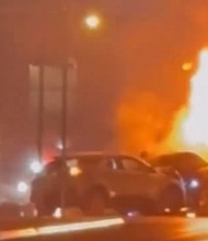 The FBI is investigating after two vehicles collided and plowed into a crowd in a fiery crash in Rochester, New York.
Mandatory Credit:	GSL News/Geoffery Rogers