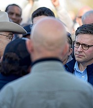 House Speaker Mike Johnson, right, is briefed by Texas Department of Public Safety chief Steve McCraw, left, on January 3 in Eagle Pass, Texas.
Mandatory Credit:	Eric Gay/AP