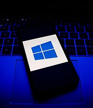 Windows logo is seen displayed on a phone screen in this illustration photo taken in Poland on November 30, 2020.
Mandatory Credit:	Jakub Porzycki/NurPhoto/Getty Images