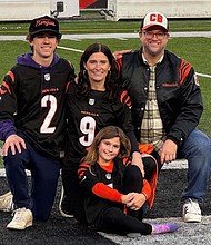 The Tomlin family at a Cincinnati Bengals game in November 2023. Christopher (top right) was watching from the stands when Damar Hamlin collapsed during the Bengals-Bills game. Laura (top middle) was at home watching on TV with their children Quentin and Ari. Quentin (top left) now takes an AED to his high school football games and practices. (Photo courtesy of Laura Tomlin)