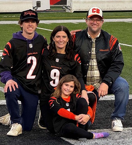 The Tomlin family at a Cincinnati Bengals game in November 2023. Christopher (top right) was watching from the stands when Damar Hamlin collapsed during the Bengals-Bills game. Laura (top middle) was at home watching on TV with their children Quentin and Ari. Quentin (top left) now takes an AED to his high school football games and practices. (Photo courtesy of Laura Tomlin)