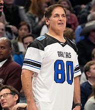 Mark Cuban is pictured here on the sidelines of the Mavericks' game against the Los Angeles Lakers in December 2023.  Cuban surprised Mavs employees on January 5 when he informed them that the team would distribute more than $35 million in bonuses.
Mandatory Credit:	LM Otero/AP