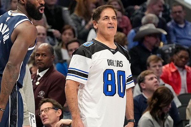 Mark Cuban is pictured here on the sidelines of the Mavericks' game against the Los Angeles Lakers in December 2023.  Cuban surprised Mavs employees on January 5 when he informed them that the team would distribute more than $35 million in bonuses.
Mandatory Credit:	LM Otero/AP