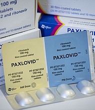 As Covid-19 and other respiratory viruses surge across the United States, the CDC warns that not enough people are utilizing available treatments.
Mandatory Credit:	Fabian Sommer/dpa/Fabian Sommer/AP Images