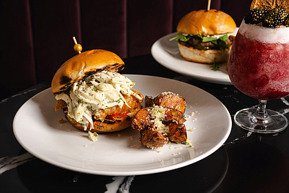 Gourmet sandwiches, like the Beer Battered Fish Sandwich (3 oz. Icelandic Cod, Lemon Dill Aioli, Fennel Slaw, and Pickled Fresno Chilis, served with Garlic Parmesan Steak Fries) will make their debut on the menu at Bungalow, exclusively for lunch.
Photos: ALife Hospitality Group