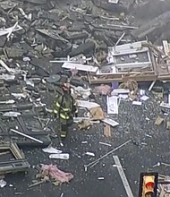 Twenty-one people were injured as a result of a gas explosion at a historic downtown Fort Worth hotel, covering the streets in debris.
Mandatory Credit:	KTVT