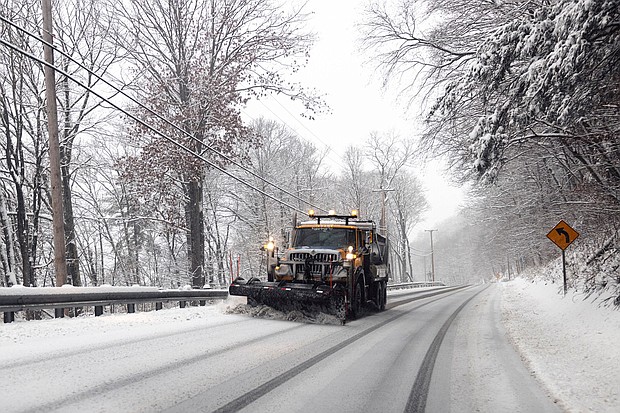 A snow plow operates during a storm in Hudson, New York, US, on Sunday, Jan. 7. Hundreds of flights have been grounded across the US from a pair of winter storms that left more than a foot of snow in New York's Hudson Valley and sparked blizzard warnings across the Great Plains.
Mandatory Credit:	Angus Mordant/Bloomberg/Getty Images
