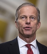 Senate Republican Whip John Thune said Congress may need to pass a short-term government funding bill – known as a continuing resolution – into the “March timeframe” in order to allow lawmakers enough time to process the 12 outstanding appropriations bills and avoid a shutdown.
Mandatory Credit:	Francis Chung/Politico/AP