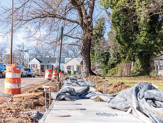 Sidewalk repairs in progress recently in the 1900 block of Claiborne Street, a Maymont area neighborhood in the city’s West End.