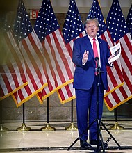 Former President Donald Trump speaks to the media at one of his properties, 40 Wall Street, following closing arguments at his civil fraud trial on January 11, in New York City.
Mandatory Credit: