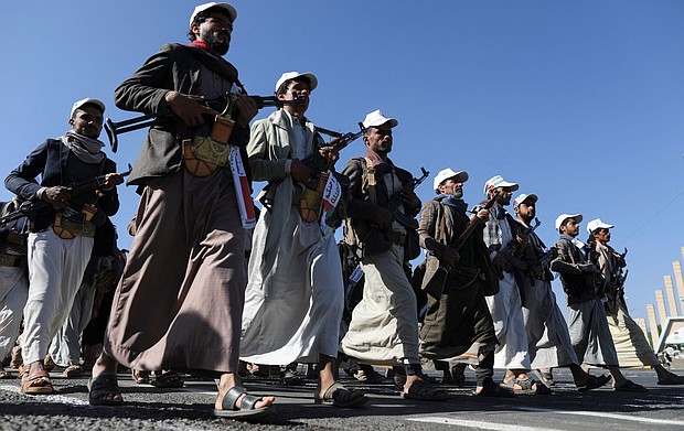 Newly recruited fighters who joined a Houthi force intended to be sent to fight in support of Palestinians in Gaza march in Sanaa, Yemen, December 2.
Mandatory Credit:	Khaled Abdullah/Reuters