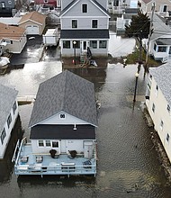 Flood waters in Hampton, New Hampshire, after a storm swept the Northeast on January 10.
Mandatory Credit:	Lauren Owens Lambert/AFP/Getty Images