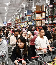 Shoppers at the new Costco store in Shenzhen, in southern China's Guangdong Province, on January 12.
Mandatory Credit:	Liang Xu/Xinhua/Zuma Press
