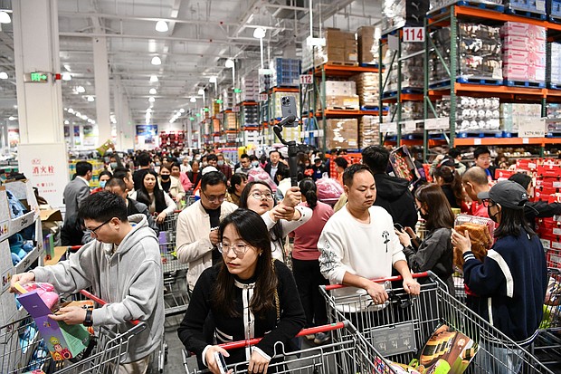 Shoppers at the new Costco store in Shenzhen, in southern China's Guangdong Province, on January 12.
Mandatory Credit:	Liang Xu/Xinhua/Zuma Press