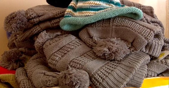 A local non-profit that aims to make sure children have warm heads and hands is getting help from a knitter …