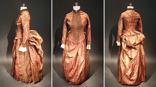 The vintage dress is from the 1880s. But despite its age, its delicate embroidery, bronze silk and metallic buttons appeared intact.
Mandatory Credit:	Courtesy Sara Rivers Cofield