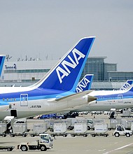 All Nippon Airways (ANA) airplanes are seen here at the Tokyo International Airport in November 2021. A domestic flight operated by ANA returned to its departure airport on January 13 after a crack was found in a window.
Mandatory Credit:	James Matsumoto/SOPA Images/LightRocket/Getty Images
