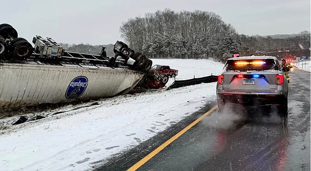 A tractor trailer hauling 40,000 pounds of bananas rolled over, closing I-95 ramp in Stonington, Connecticut.
Mandatory Credit:	WFSB