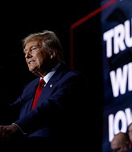 Republican presidential candidate and former President Donald Trump speaks during his Iowa caucus night watch party in Des Moines, Iowa, Monday, January 15.
Mandatory Credit:	Evelyn Hockstein/Reuters