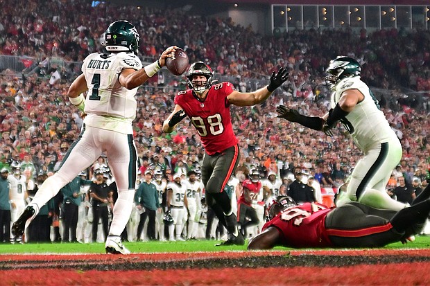 Jalen Hurts of the Philadelphia Eagles throws the ball for an intentional grounding that led to a safety against the Tampa Bay Buccaneers.
Mandatory Credit:	Julio Aguilar/Getty Images