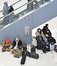 Over 320 flights have been canceled because of a winter storm that brought snow and freezing temperatures to Denver International Airport in Denver, Colorado on January 15.
Mandatory Credit:	RJ Sangosti/MediaNews Group/The Denver Post/Getty Images